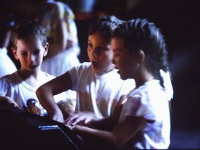 Kids interacting with plasma exhibit Kids interacting with plasma exhibit